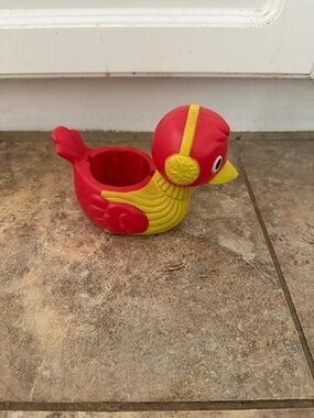 Red and Yellow 1974 vintage Kenner “Ice Bird” shaver for snow cones